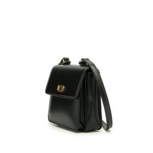 Black smooth calf leather crossbody bag with a brass turn-lock flap