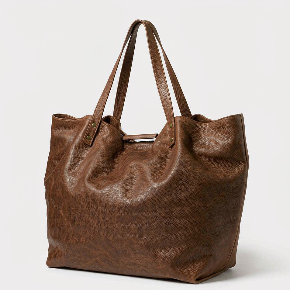 Large cognac vegetable-tanned leather weekender tote bag with flat top handles